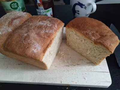 Fluffy Coco Bread Recipe - Vegan Tahitian Specialty : Slicing up a fluffy coco bread from Tahiti